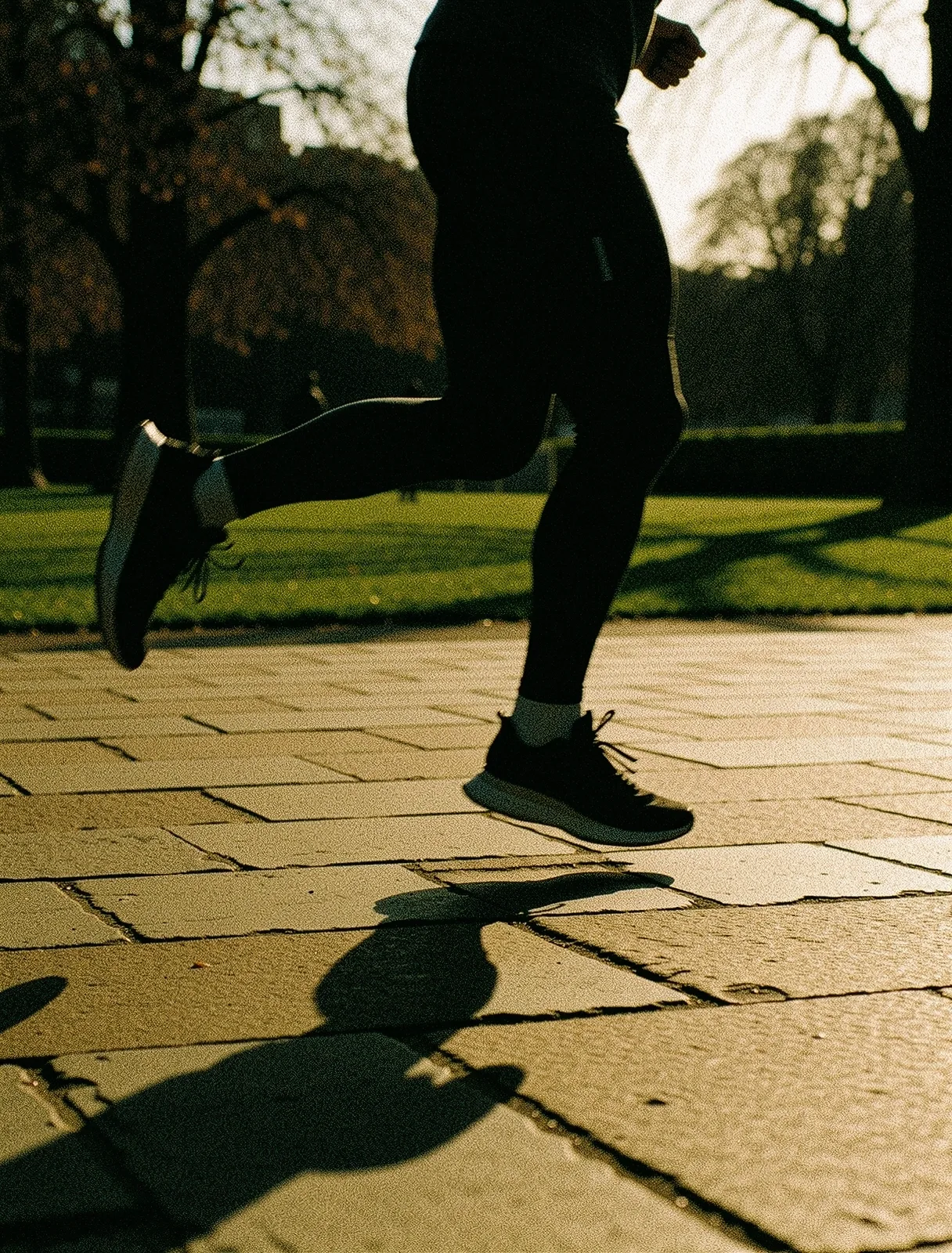 The rhythmic motion of a stride on urban stone